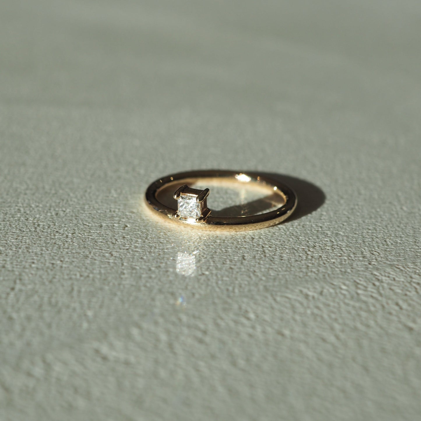 Offset Solitaire Engagement Ring Featuring 0.20 CT Princess Moissanite 5