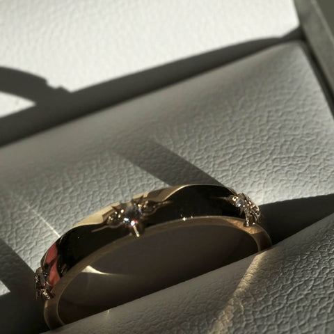 Flush Setting Wedding Band Featuring 0.15 TCW Round Moissanite 5