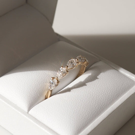 Half Eternity Wedding Band Featuring 1.0 TCW Pear Moissanite 1