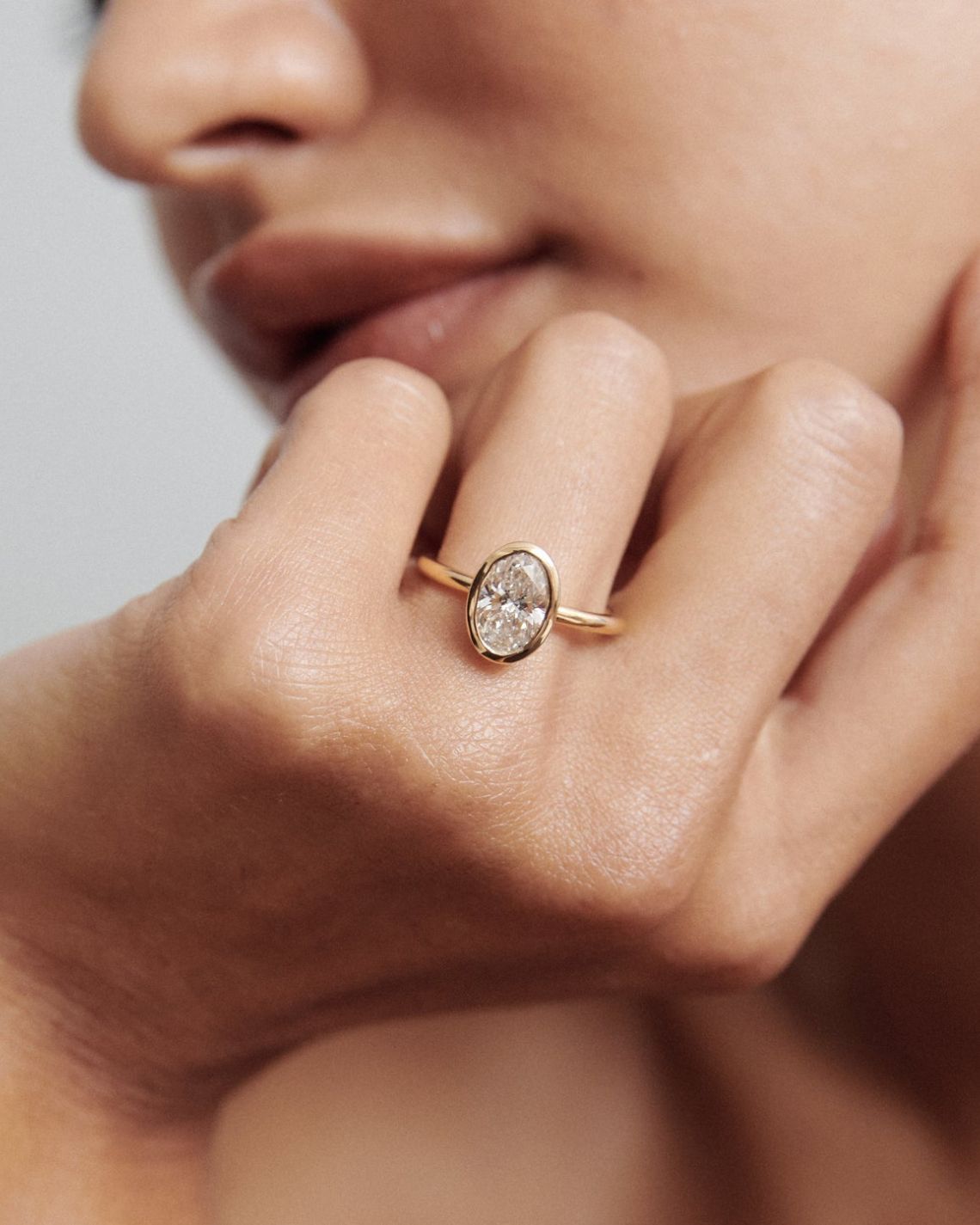 Bezel Setting Engagement Ring Featuring 1.5 CT Oval Moissanite 1