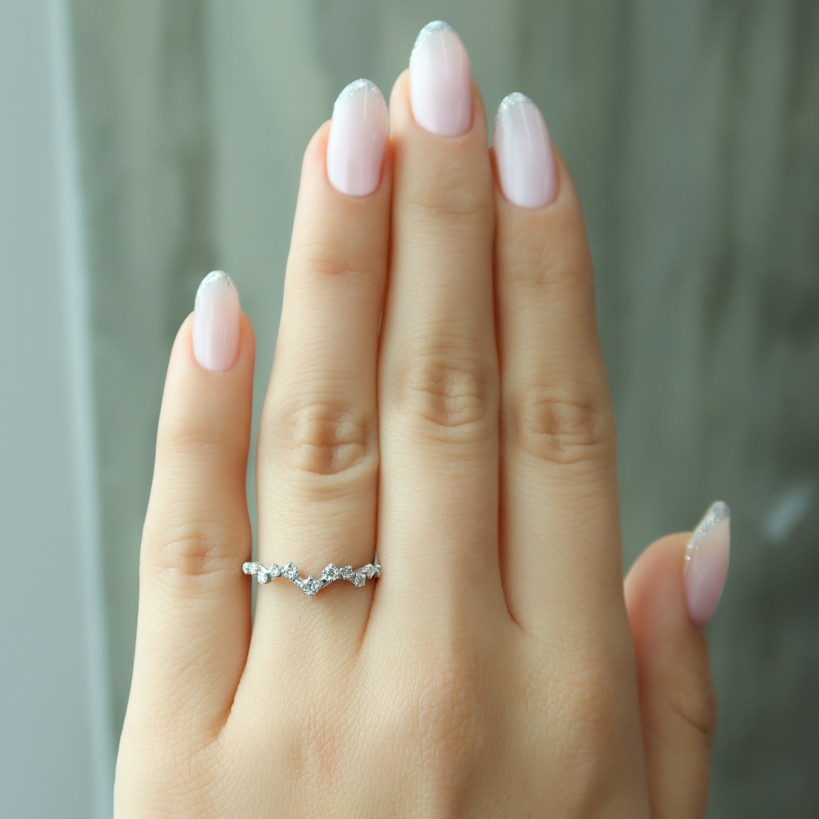 Curved Wedding Band Featuring 0.20 TCW Round Moissanite 5