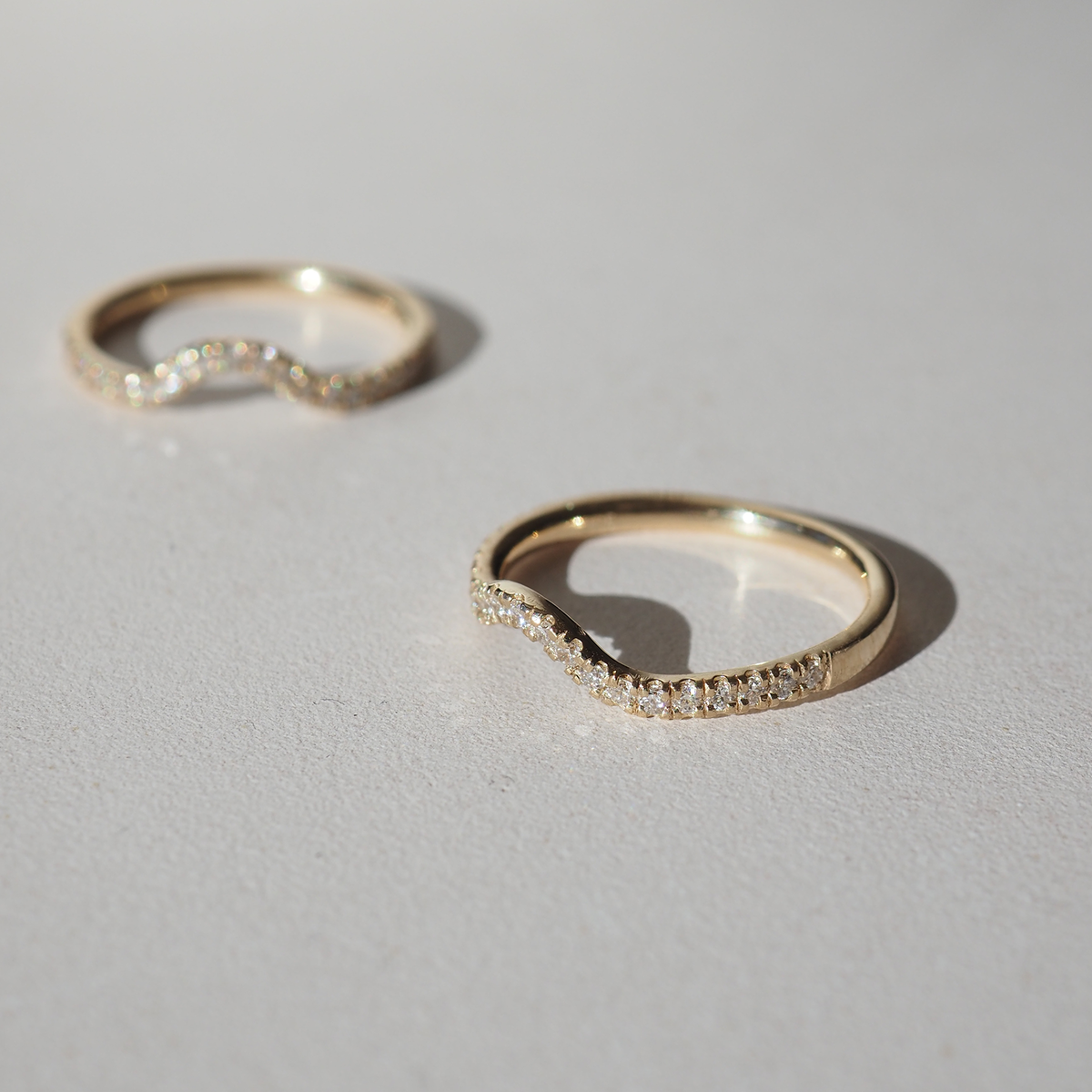 Curved Wedding Band Featuring 0.20 TCW Round Moissanite 10