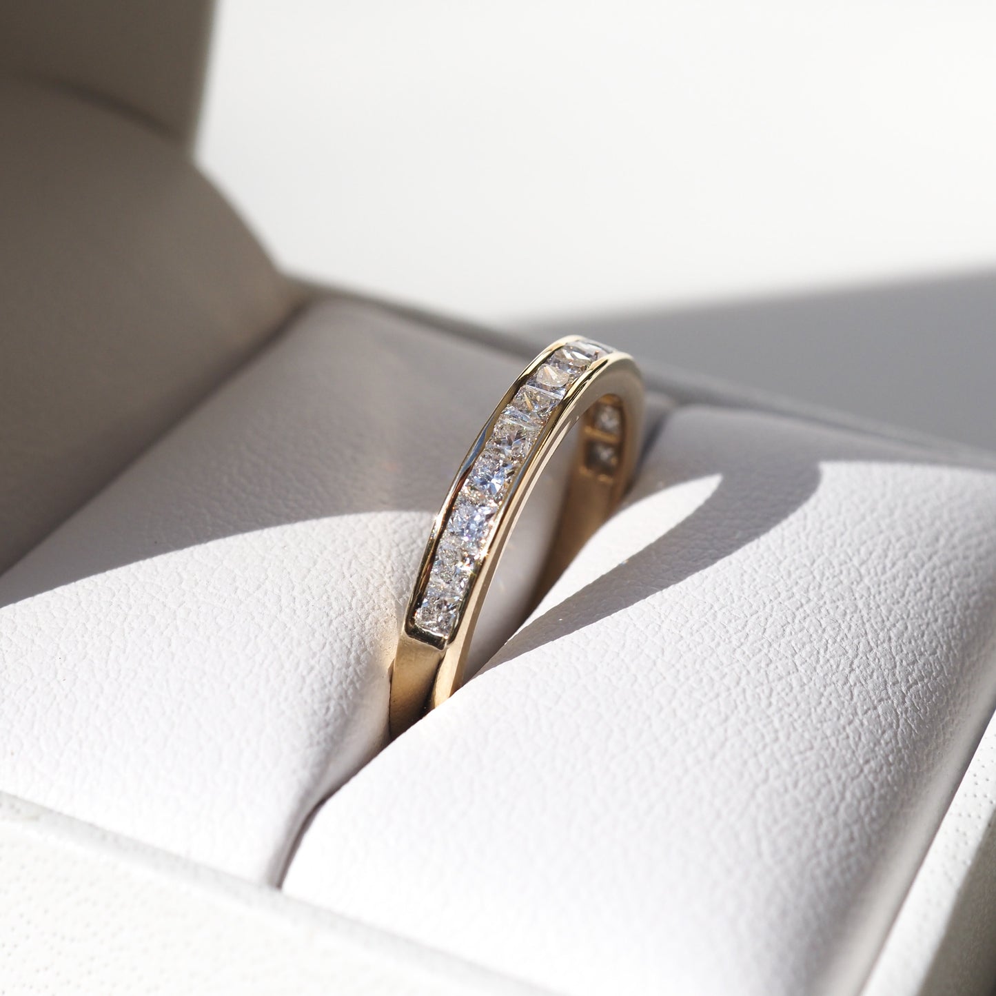 Channel Wedding Band Featuring 0.90 TCW Princess Moissanite 1