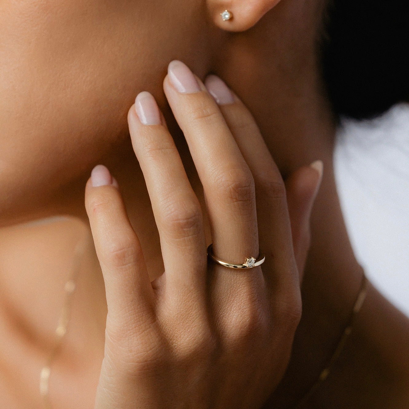 Offset Solitaire Engagement Ring Featuring 0.20 CT Round Moissanite 3