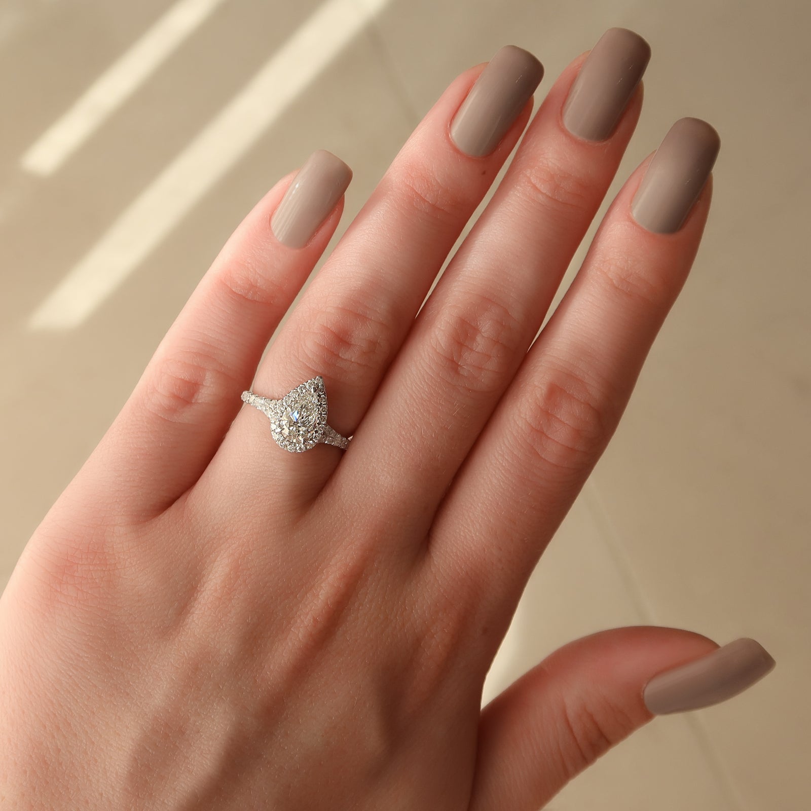 Halo & Split Shank Engagement Ring Featuring 1.0 CT Pear Moissanite 3