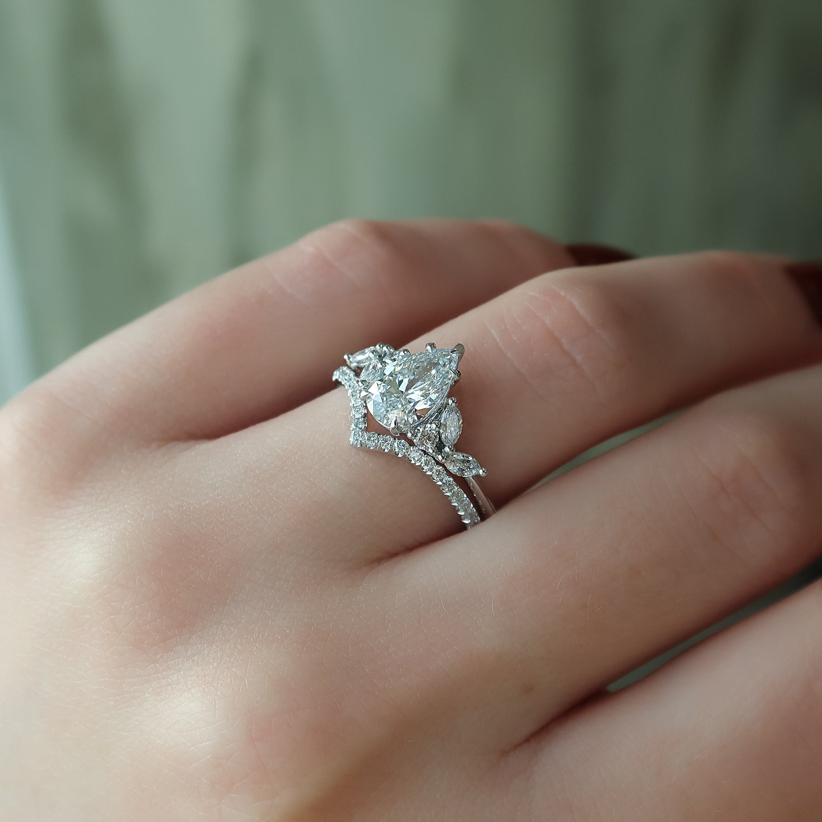Cluster Engagement Ring Featuring 1.5 CT Pear Moissanite 5