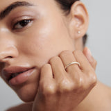 Knife Edge Wedding Band Featuring 0.1 TCW Round Moissanite 4