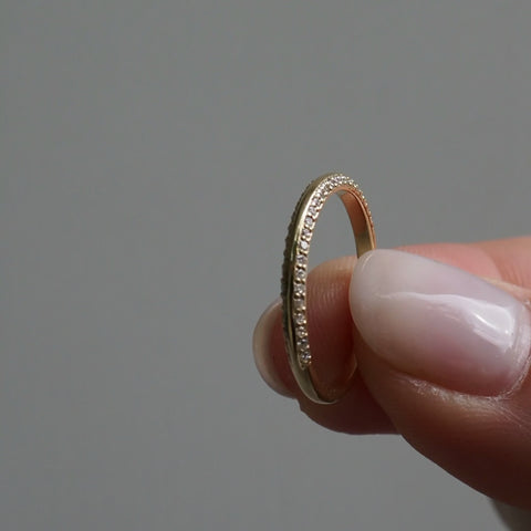 Knife Edge Wedding Band Featuring 0.1 TCW Round Moissanite 10