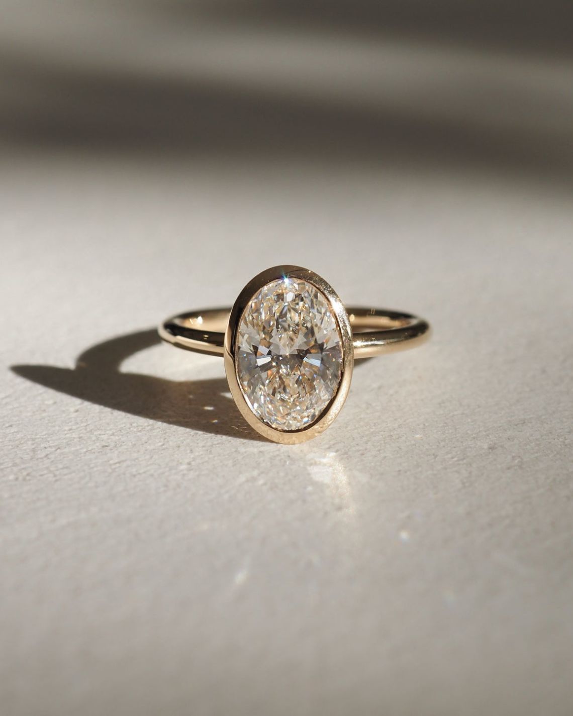 Bezel Setting Engagement Ring Featuring 1.5 CT Oval Moissanite 1