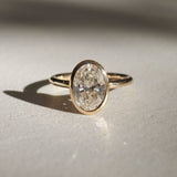 Bezel Setting Engagement Ring Featuring 1.5 CT Oval Moissanite 1