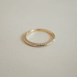 Knife Edge Wedding Band Featuring 0.1 TCW Round Moissanite 9