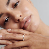 Curved Wedding Band Featuring 0.20 TCW Round Moissanite 3