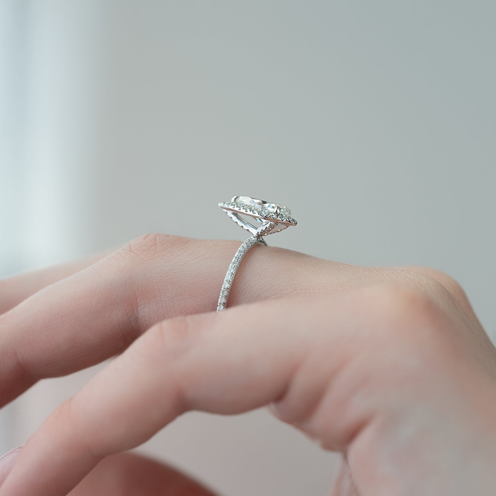 Halo Engagement Ring Featuring 1.5 CT Pear Moissanite 4