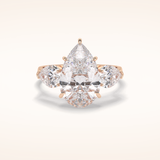 1.29 CT Pear Shaped Three Stone Moissanite Engagement Ring