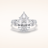 1.29 CT Pear Shaped Three Stone Moissanite Engagement Ring