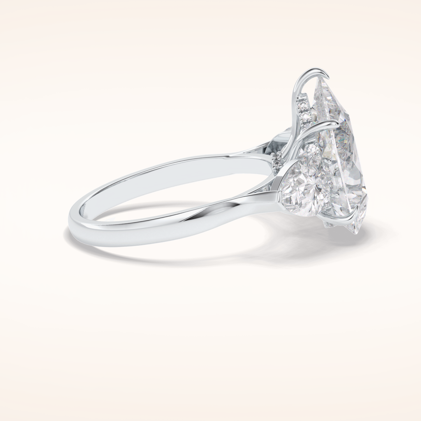 1.29 CT Pear Shaped Three Stone Moissanite Engagement Ring