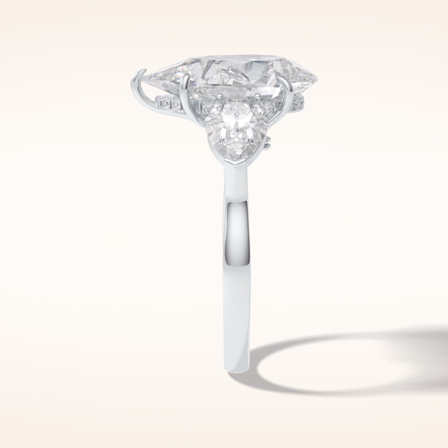 1.29 CT Pear Shaped Three Stone Moissanite Engagement Ring