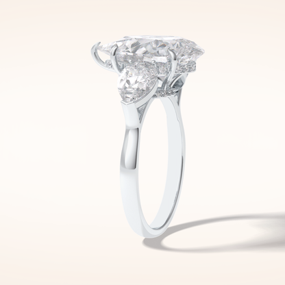 1.29 CT Pear Shaped Three Stone Moissanite Engagement Ring