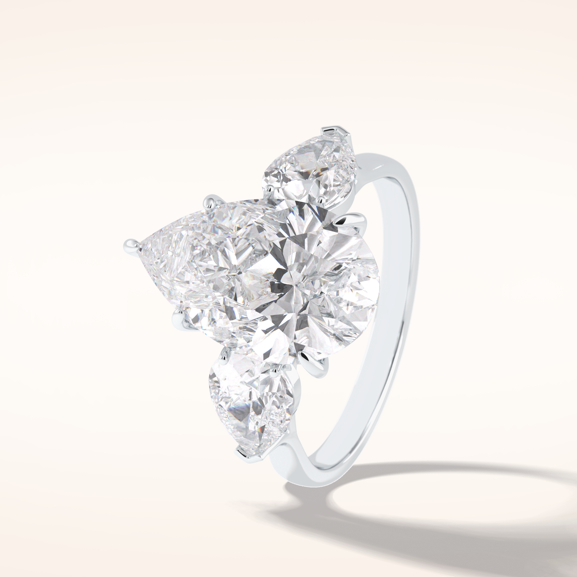 1.29 CT Pear Shaped Three Stone Moissanite Engagement Ring