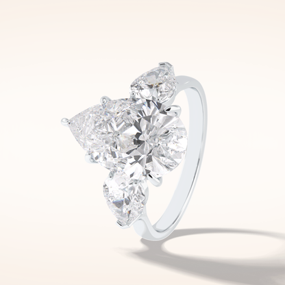 1.29 CT Pear Shaped Three Stone Moissanite Engagement Ring
