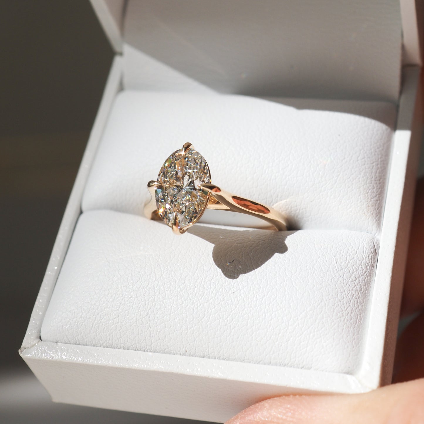 Solitaire Engagement Ring Featuring 1.5 CT Oval Moissanite 1