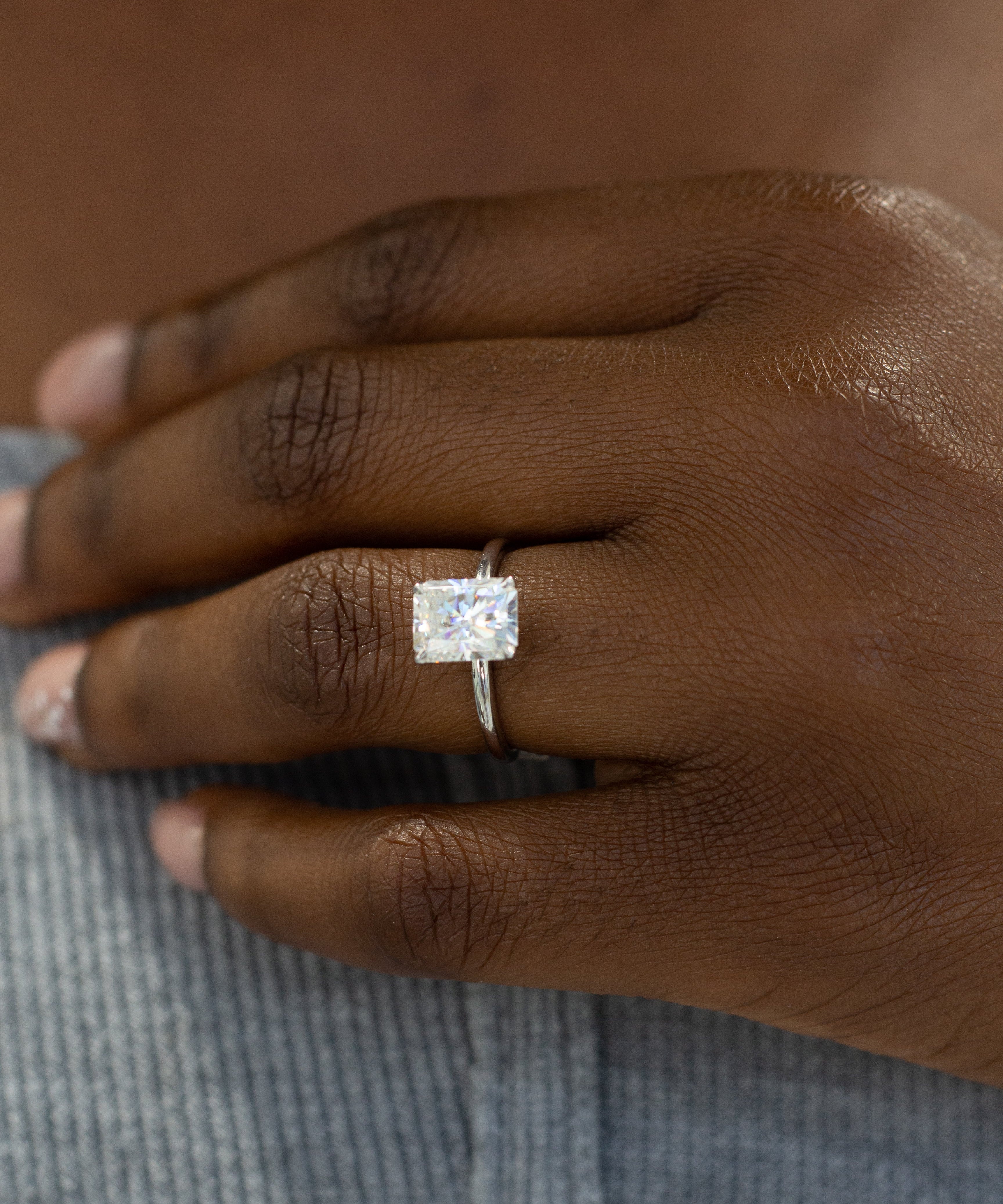 Solitaire Engagement Ring Featuring 1.2 CT Radiant Moissanite 1