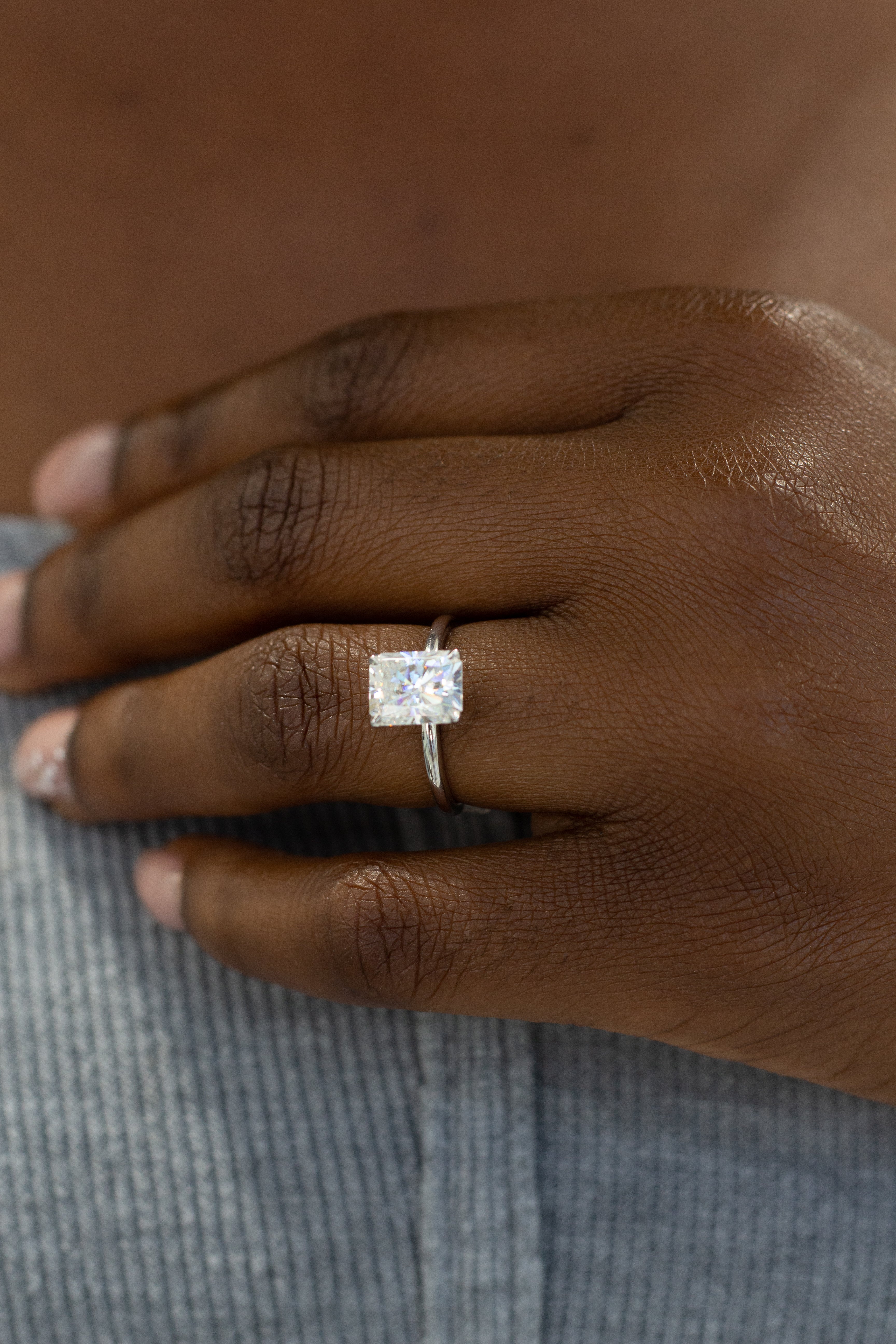 Solitaire Engagement Ring Featuring 1.2 CT Radiant Moissanite 1