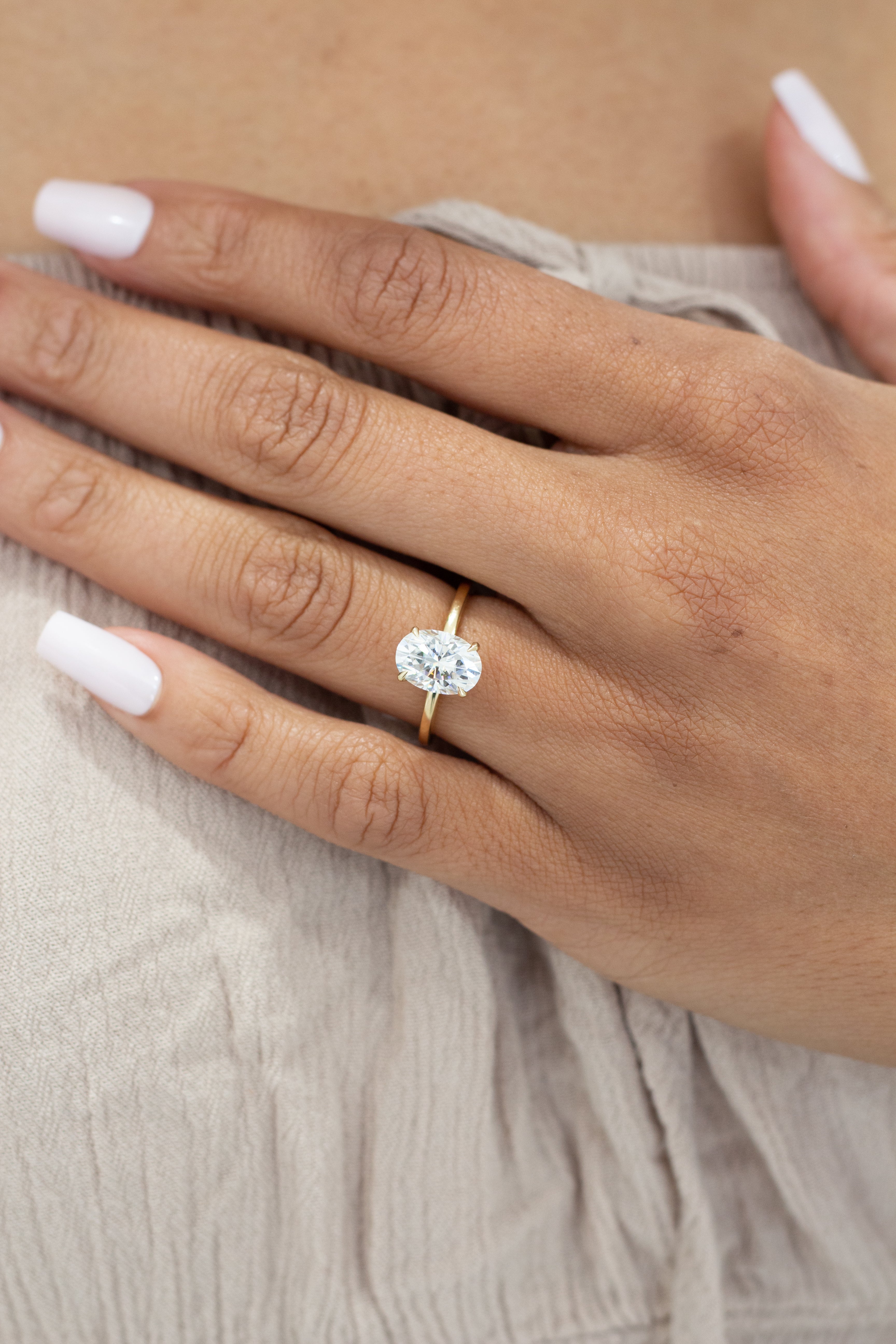Hidden Halo Engagement Ring Featuring 1.8 CT Oval Moissanite 1