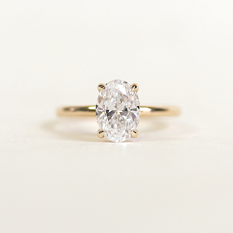 Hidden Halo Engagement Ring Featuring 1.50 CT Oval Moissanite 1