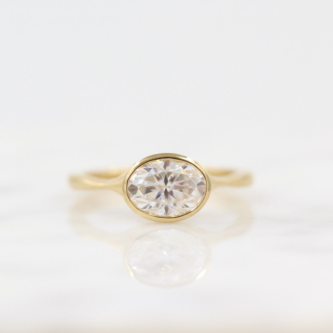 East West Oval Bezel Lab Grown Diamond Engagement Ring