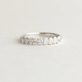 Half Eternity Wedding Band Featuring 0.54 TCW Oval Moissanite 1