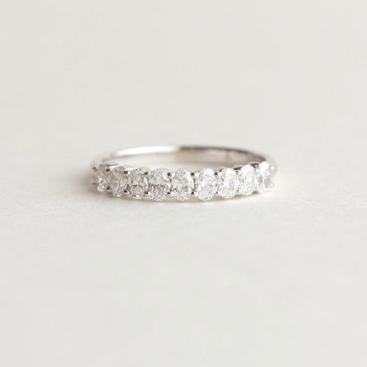 Half Eternity Wedding Band Featuring 0.54 TCW Oval Moissanite 1