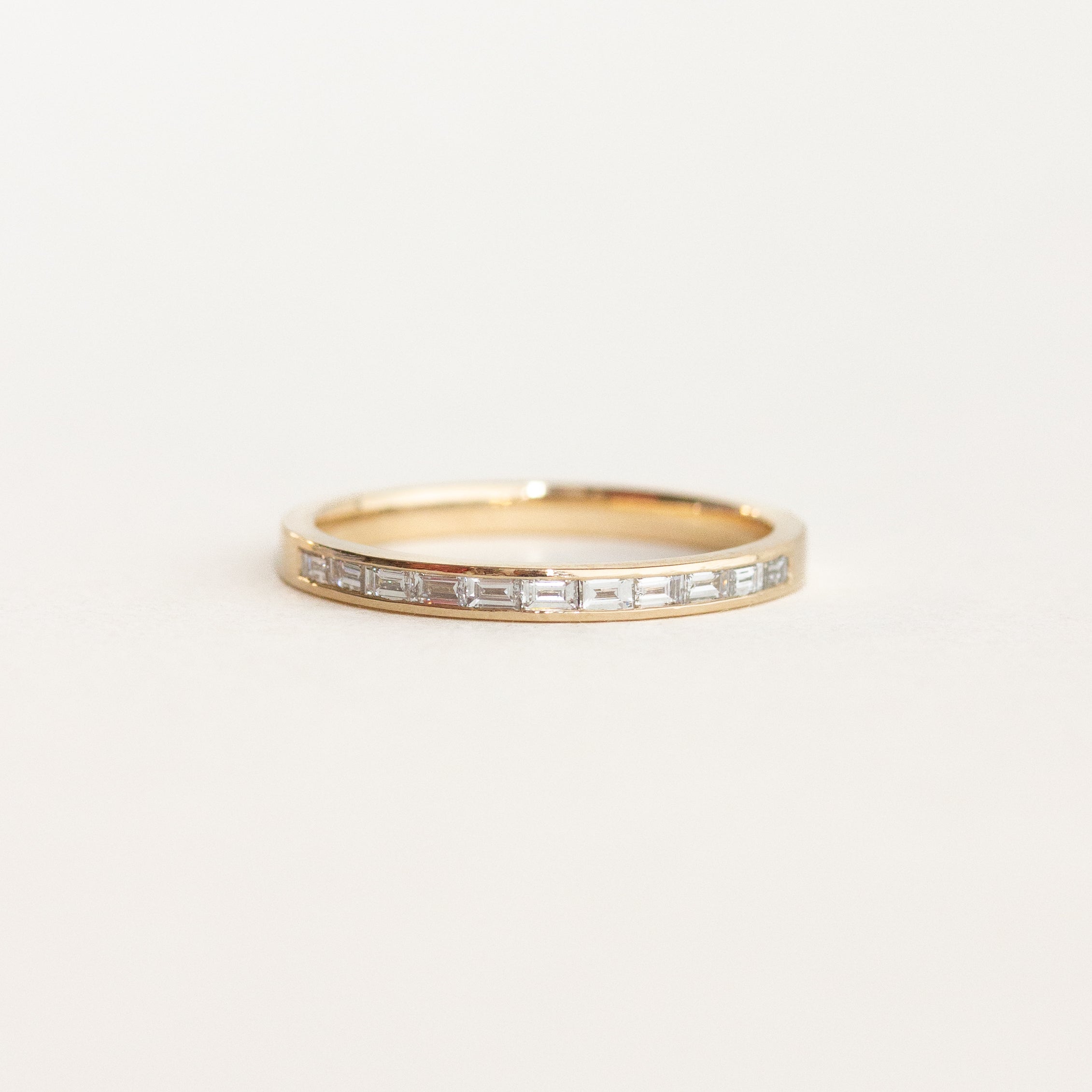 Half Eternity Wedding Band Featuring 0.22 TCW Baguette Moissanite 1