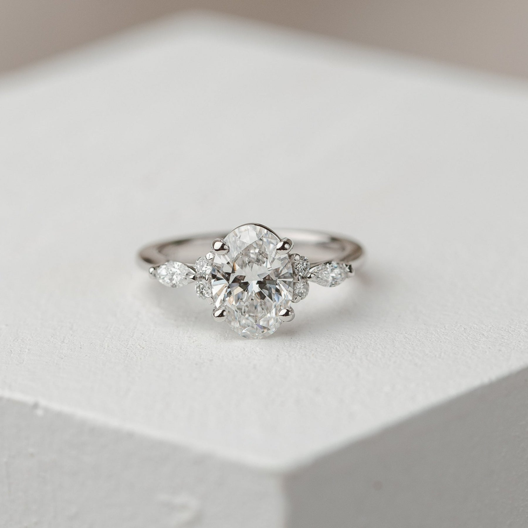 1.0 CT Oval Shaped Moissanite Engagement Ring In Cluster Design 14