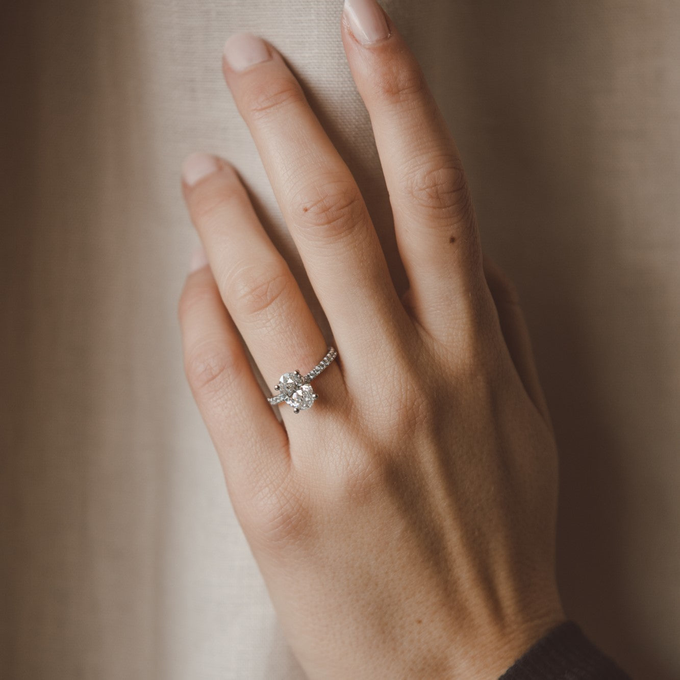 1.0 CT Oval Shaped Moissanite Engagement Ring In Hidden Halo 12