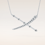 0.34 TCW Round Cut Moissanite X Necklace