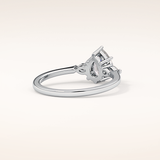 0.86 CT Pear Shaped Three Stone Moissanite Engagement Ring
