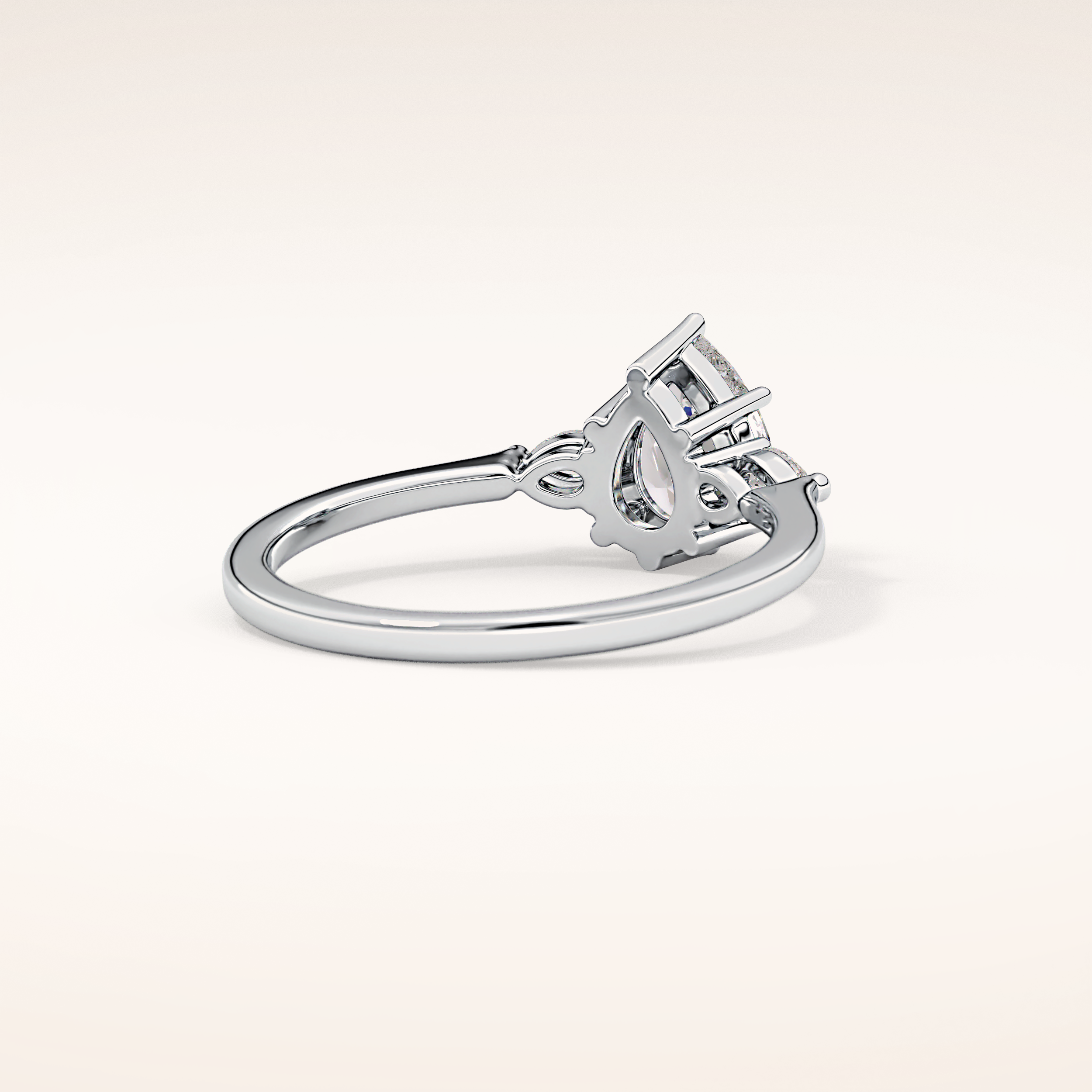 0.86 CT Pear Shaped Three Stone Moissanite Engagement Ring