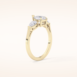 0.81 CT Pear Shaped Three Stone Moissanite Engagement Ring
