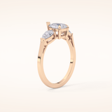 0.81 CT Pear Shaped Three Stone Moissanite Engagement Ring