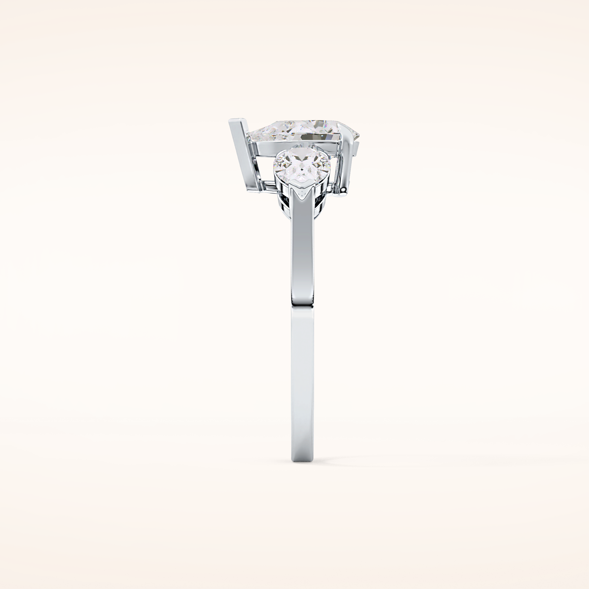 0.81 CT Pear Shaped Three Stone Moissanite Engagement Ring