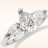 0.81 CT Pear Shaped Three Stone Moissanite Engagement Ring