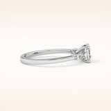 0.65 CT Emerald Shaped Three Stone Moissanite Engagement Ring
