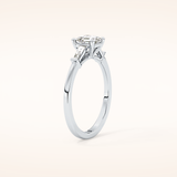 0.65 CT Emerald Shaped Three Stone Moissanite Engagement Ring