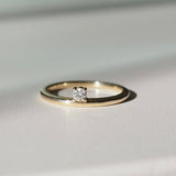 Offset Solitaire Engagement Ring Featuring 0.20 CT Round Moissanite 1