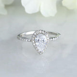 Halo Engagement Ring Featuring 1.0 CT Pear Moissanite 2