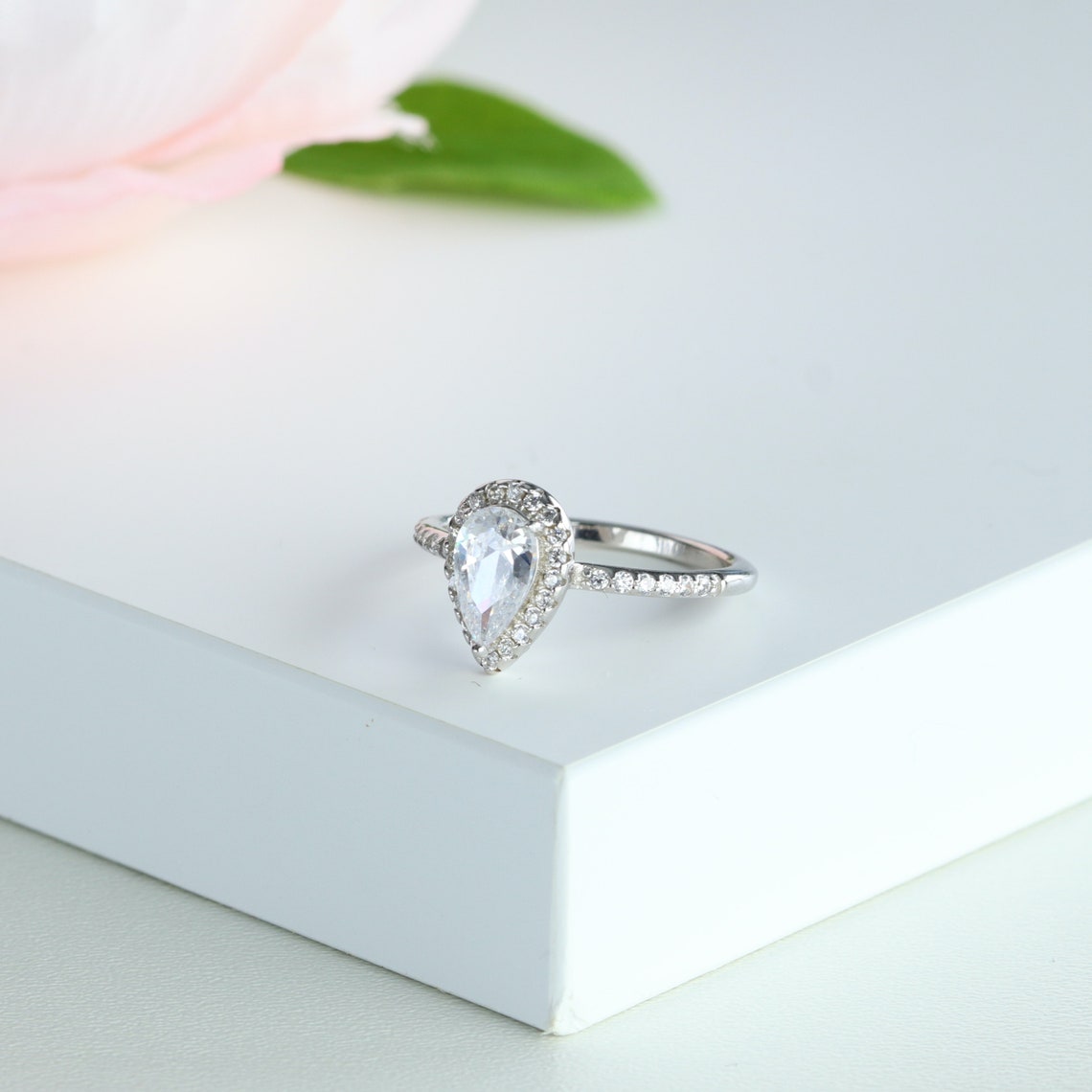 Halo Engagement Ring Featuring 1.0 CT Pear Moissanite 3