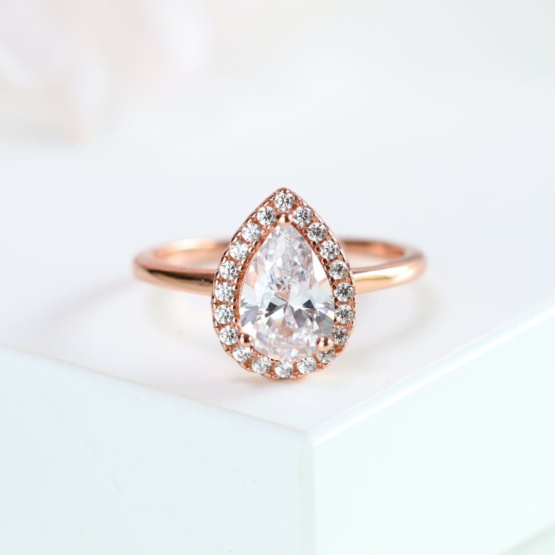 Halo Engagement Ring Featuring 1.50 CT Pear Moissanite 1