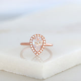 Halo Engagement Ring Featuring 1.50 CT Pear Moissanite 3