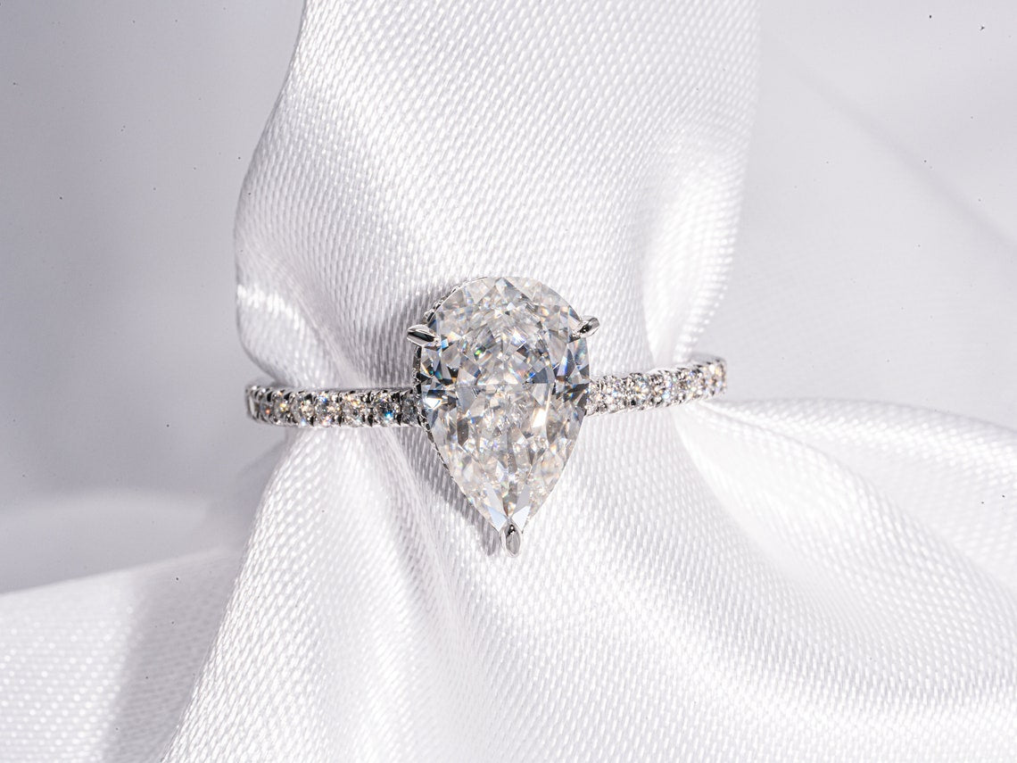 Hidden Halo & Pave Engagement Ring Featuring 2.50 CT Pear Moissanite 1